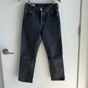 Levi’s 501s button close. Washed black. W25, L26.